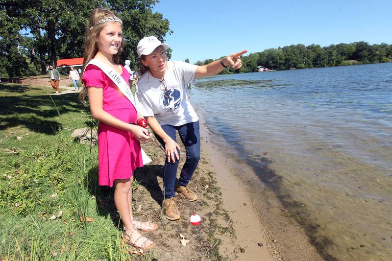 Ella Niedzwiecki (Little Miss Round Lake Area 2023) talks with Kathy Paczynski, recreation supervisor, while fishing on the shore of Round Lake during the Family Fishing Event at Lake Front Park on Saturday, September 9th in Round Lake Beach. The event was sponsored by the Round Lake Area Park District and the Huebner Fishery Management Foundation.
Photo by Candace H. Johnson for Shaw Local News Network