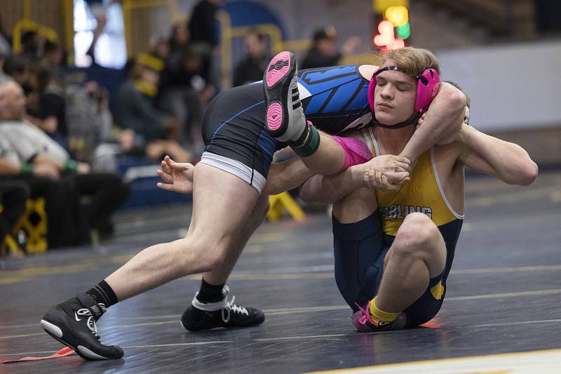 Sterling’s Christopher Wellman is controlled by Quincy’s Gunnar Derhake at 165 pounds Friday, Jan. 31, 2025, during the Western Big 6 conference wrestling tournament held at Sterling High School.