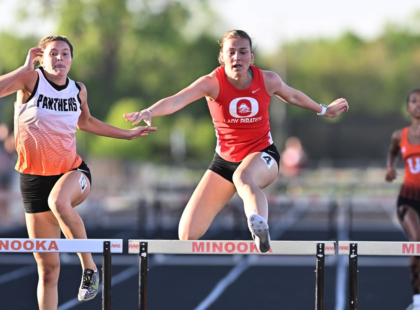 Ottawa's Isabella Markey competies in the 300 meter hurdles during the IHSA 3A sectional track meet Wednesday, May 8, 2024, at Minooka.