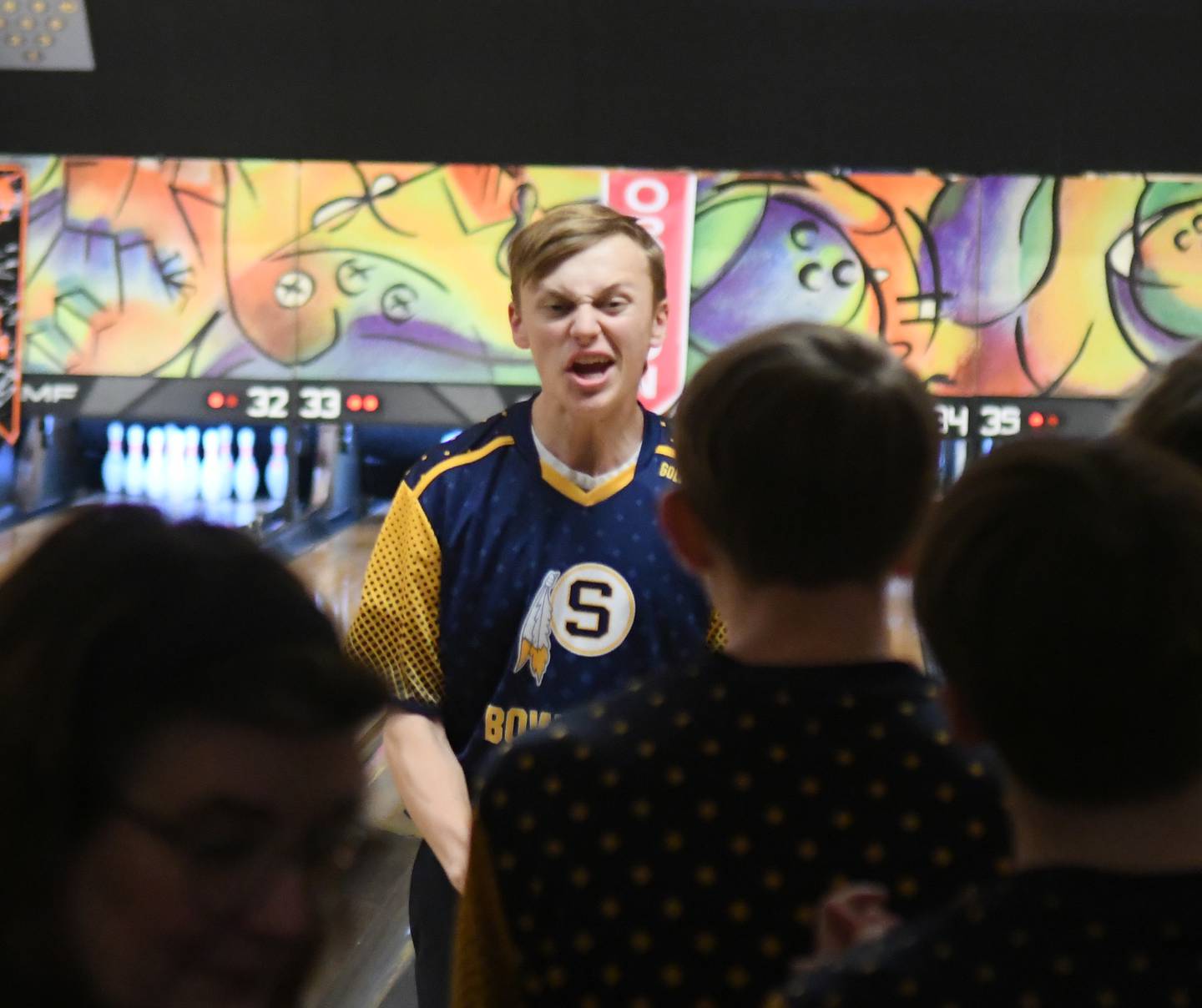 Sterling's Dylan Doss celebrates a strike with his team during the IHSA bowling sectional at Don Carter Lanes in Rockford on Saturday, Jan. 21.