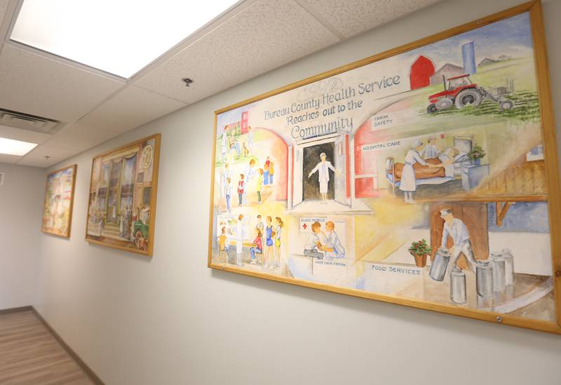 Artist Mary Win Walter Norris painted three pieces that hang on the wall at the Bureau County Health Department and Bureau County Famiily Health Clinic on Friday, June 6, 2025 in Princeton.