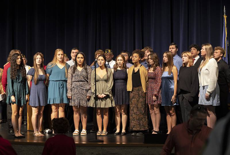 The Sterling High School Madrigals sing the National Anthem Monday, Nov. 11, 2024, at Centennial Auditorium in Sterling during a Veterans Day ceremony.