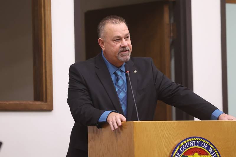Will County Sheriff Mike Kelley shares a few words at his swearing-in ceremony at the Will County Building in Joliet on Thursday.