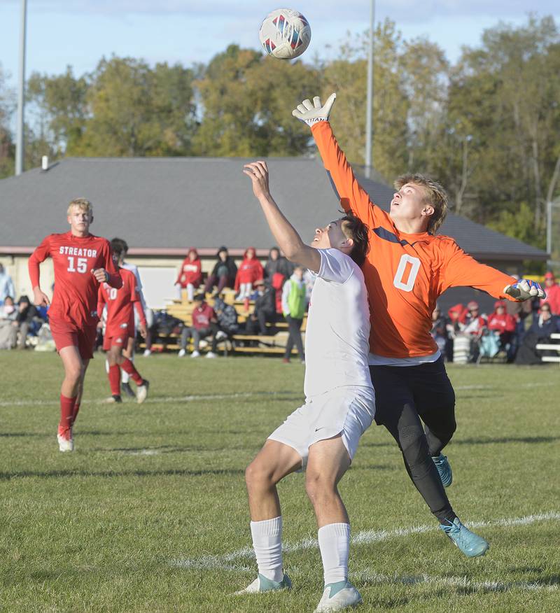 Ottawa’s Jorge Lopez tries to get the ball past Streator goalkeeper Seth Zito in the 1st half Tuesday at Streator.