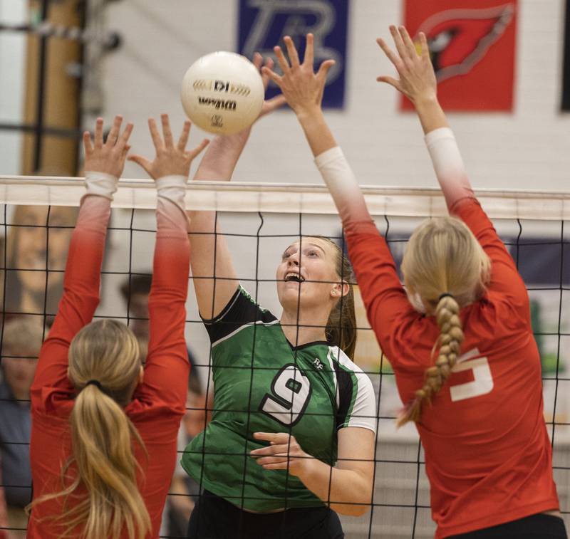 Rock Falls' Kayla Hackbarth spikes against the Oregon defense Wednesday, Oct. 22, 2025.