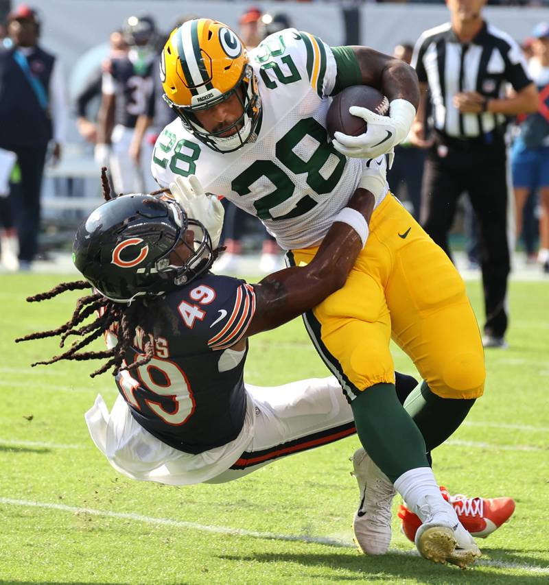 Chicago Bears linebacker Tremaine Edmunds brings down Green Bay Packers running back AJ Dillon during their game Sunday, Sept. 10, 2023, at Soldier Field in Chicago.