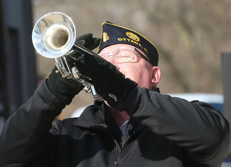 Ottawa American Legion Post 33 trumpeter Gary Wood offers his rendition of "Taps" during the annual Pearl Harbor parade and memorial service on Saturday in Peru. This year marks the 83rd anniversary of the Dec. 7, 1941, attack on Pearl Harbor.