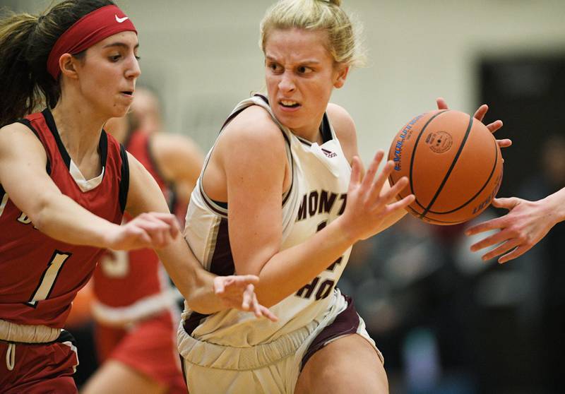 John Starks/jstarks@dailyherald.com
Montini’s Shannon Blacher drives against Deerfield’s Nikki Kerstein in the Lake Zurich 2022 Exam Jamm girls basketball tournament on Tuesday, December 13, 2022.