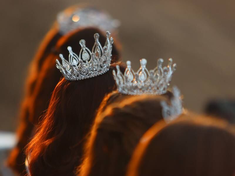 Reigning queens in the audience watch the Miss McHenry County Pageant at the McHenry County Fair in Woodstock on Tuesday, July 30, 2024.