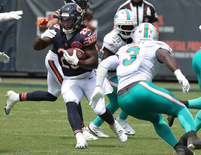 Chicago Bears running back Kyle Monangai looks to get by Miami Dolphins linebacker K.J. Britt Sunday, Aug. 10, 2025, during their preseason game at Soldier Field in Chicago.