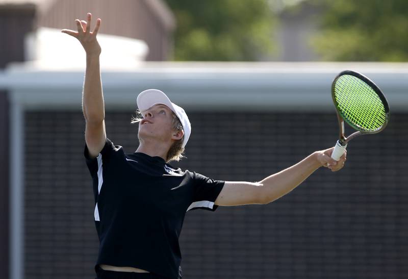 Downers Grove North’s Joe Leckie serves the ball as he competes in the Class 2A Boys State Tennis Tournament on Thursday, May 23, 2024, at Hersey High School in Arlington Heights.