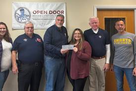 Knights raise nearly $5K for Open Door in Sandwich