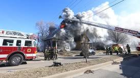 Photos: La Salle firefighters battle two-story house fire on Bucklin Street