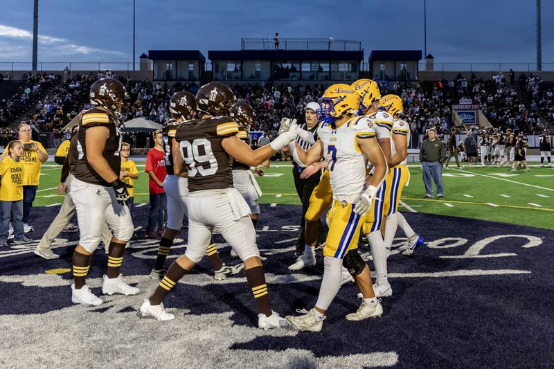 Joliet Catholic and Lyons Township face-off during a varsity football game at Busey Bank Field at Joliet Memorial Stadium on Aug. 29, 2025.
