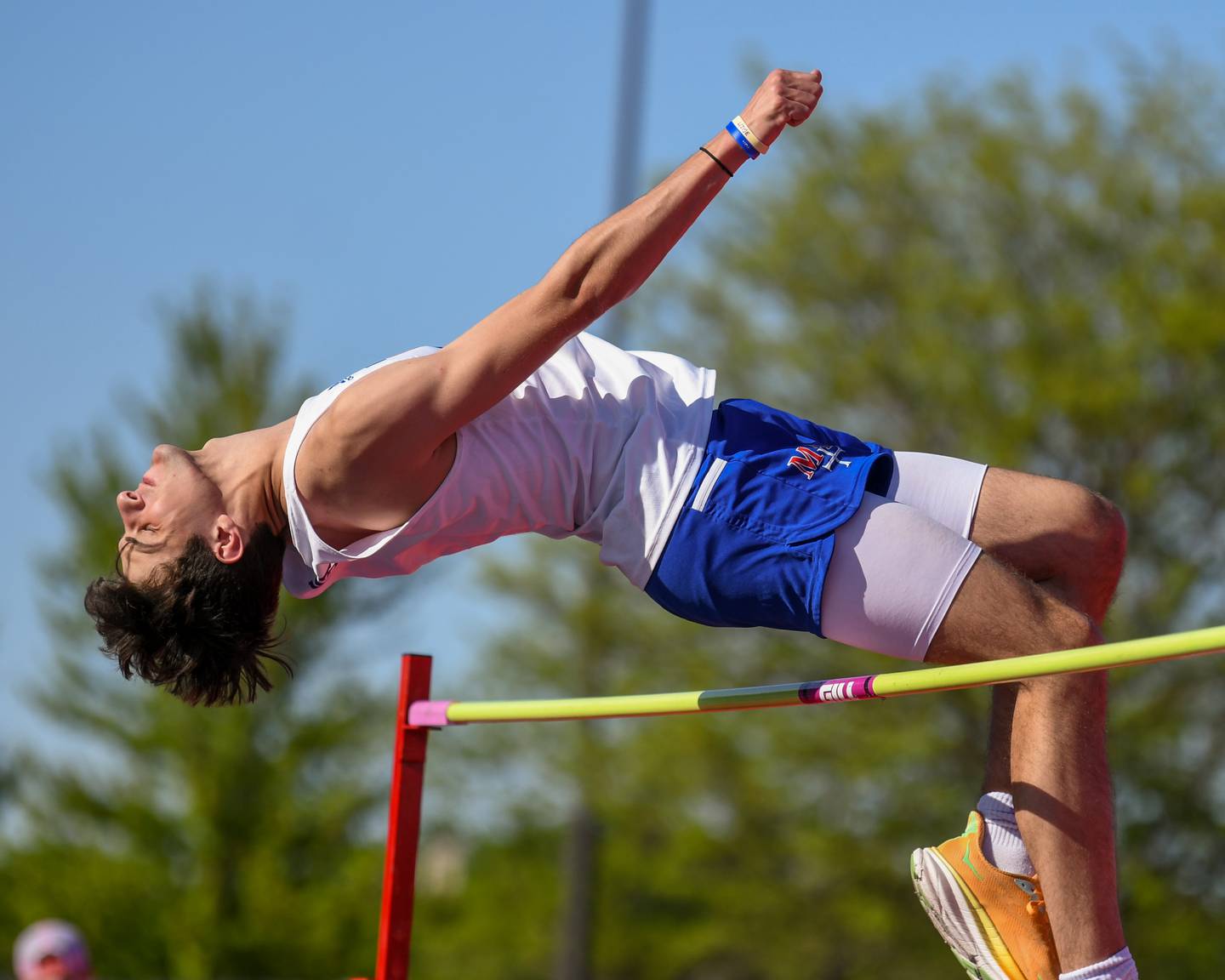 Jonah Augustyn of Marmion clears the bar during the Kane County Track and field meet held at Marmion Academy in Aurora on Friday May 3, 2024.