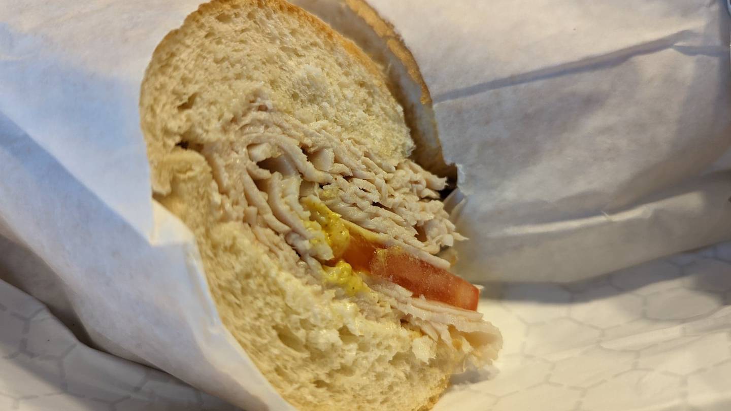 The hand-carved turkey sub from Mark's on 59 in Shorewood came with mayo, romaine lettuce, turkey, mustard, Swiss cheese, tomato and red onion. We skipped the cheese and romaine and added our own lettuce.