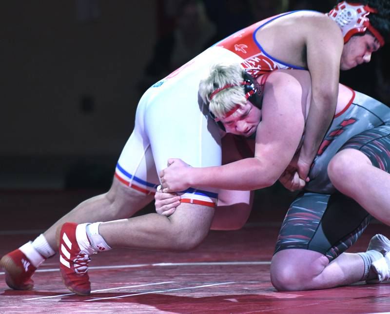 Oregon's Yovanni Carreno and Fulton's Jack Holmbo wrestle in the 285-pound match on Thursday, Dec. 4, 2025 at Oregon High School.
