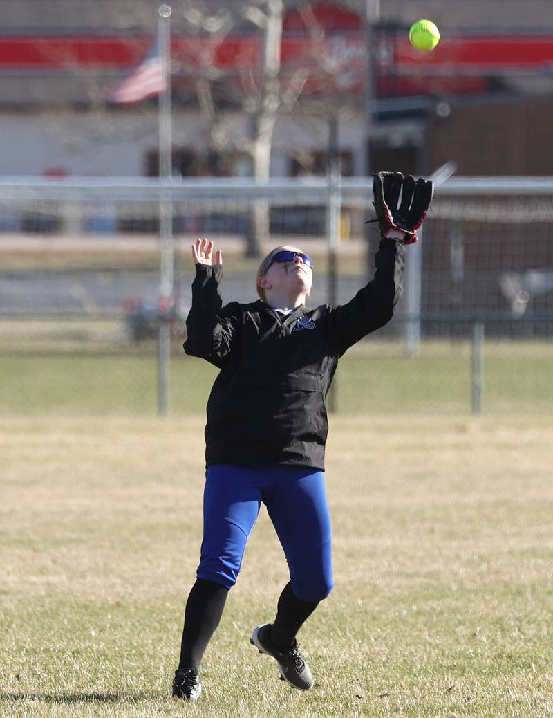 Hinckley-Big Rock's Jennifer Hanacek is camped under a flyball Monday, March 23, 2026, during their game against Genoa-Kingston at Hinckley-Big Rock High School.