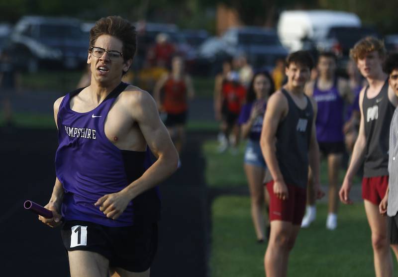 Hampshire’s Mitchell Dalby cruises to the finish line as he races the final leg of the 4 x 800 meter relay during Fox Valley Conference boys track and field meet Friday, May 13, 2022, at Crystal Lake Central High School.