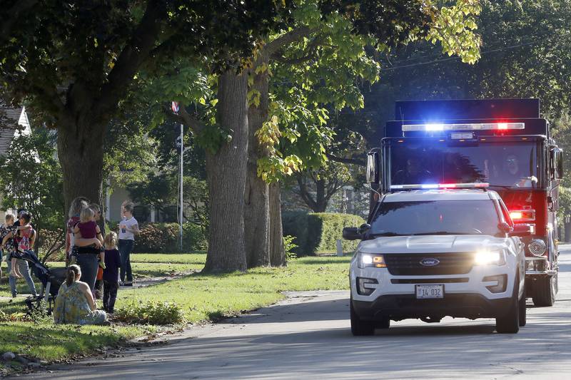 The Marengo police and fire departments kick off the Children's Pet Parade during the annual Settlers Days events on Saturday, Oct. 9, 2021, in Marengo.