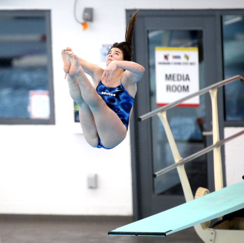 Oswego’s Katie Malm dives during the IHSA Girls State Championships on Saturday, Nov. 16, 2024 at FMC Natatorium in Westmont.