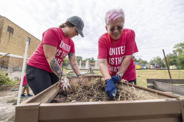 United Way volunteers lend a hand during Day of Caring in Lee, Ogle counties
