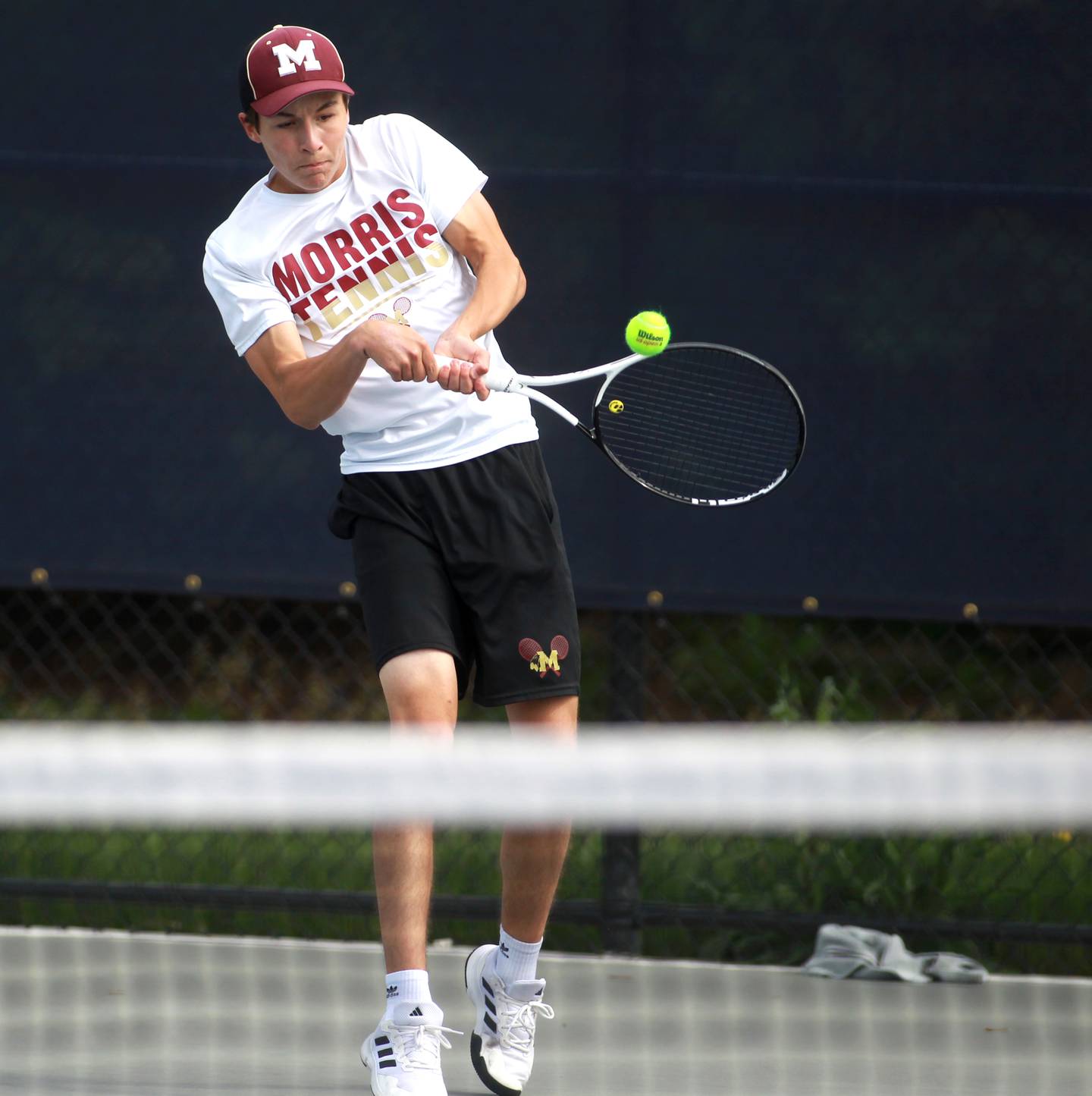 Connor Barth of Morris returns the ball during the first round of the 1A boys state tennis meet on Thursday, May 29. 2025 at Buffalo Grove High School.