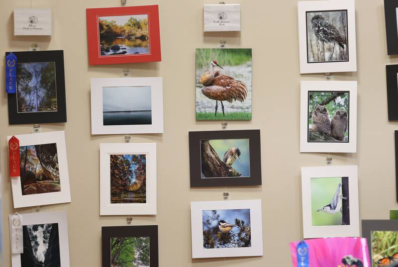 A selection of photos hang during the Starved Rock Photography Show awards on Saturday, Jan. 3, 2026 at the Starved Rock Visitors Center. The show brought in 86 entries were submitted for this years show.