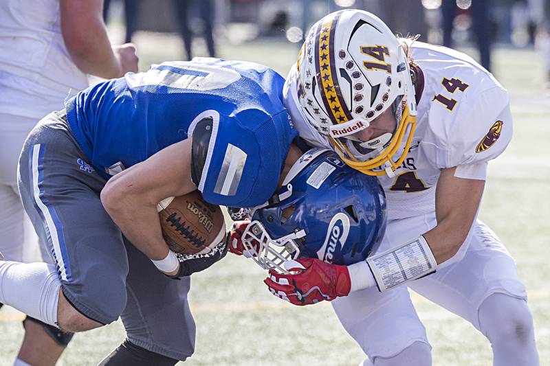 Newman’s Brady Williamson powers in for a score against ROWVA’s Jack Godsil Saturday, Oct. 28, 2023 in the Class 1A playoffs in Sterling.