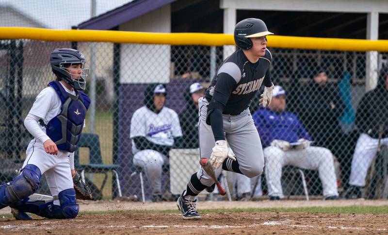Sycamore's Kiefer Tarnoki (7) singles driving in a run against Plano during a baseball game at Plano High School on Monday, April 4, 2022.