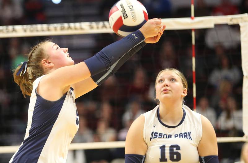 Cissna Park's Mady Marcott returns a serve from Calhoun as teammate Faith Kaeb looks on during the Class 1A State semifinal game on Friday, Nov. 15, 2024 at CEFCU Arena in Normal.