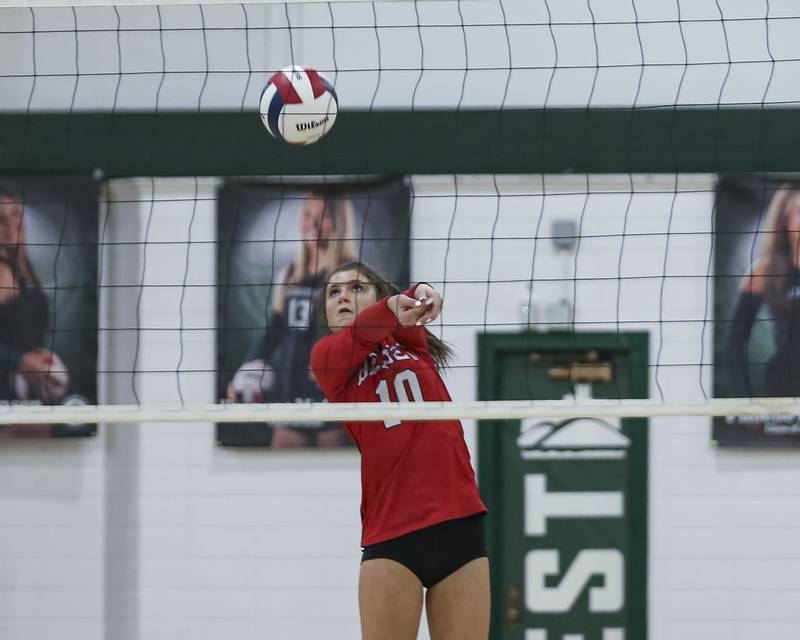 Benet's Claire Weathers (10) digs out a serve during Class 4A Glenbard West Sectional final volleyball match between St Charles North at Benet. Nov 6, 2025 in Glen Ellyn.