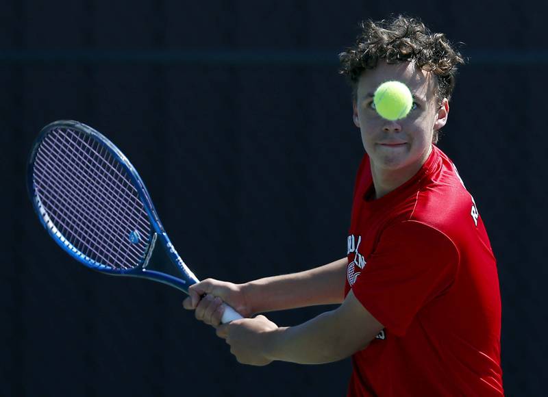 Nathan Hernandez of Hinsdale Central returns a shot during the Hersey Boys Tennis Invitational Saturday, May 3, 2025 in Arlington Heights.
