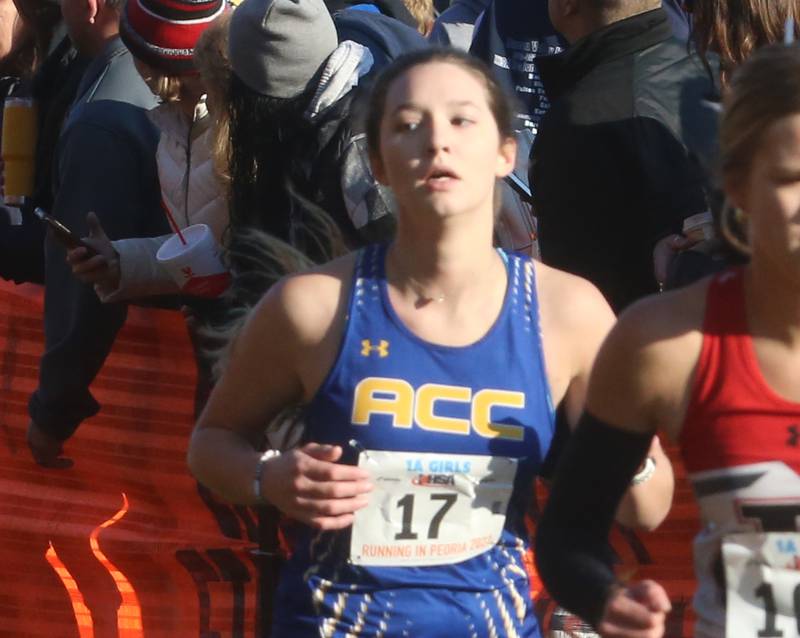 Aurora Central Catholic's Olivia Koral competes in the Class 1A Cross Country Finals on Saturday, Nov. 4, 2023 at Detweiller Park in Peoria.