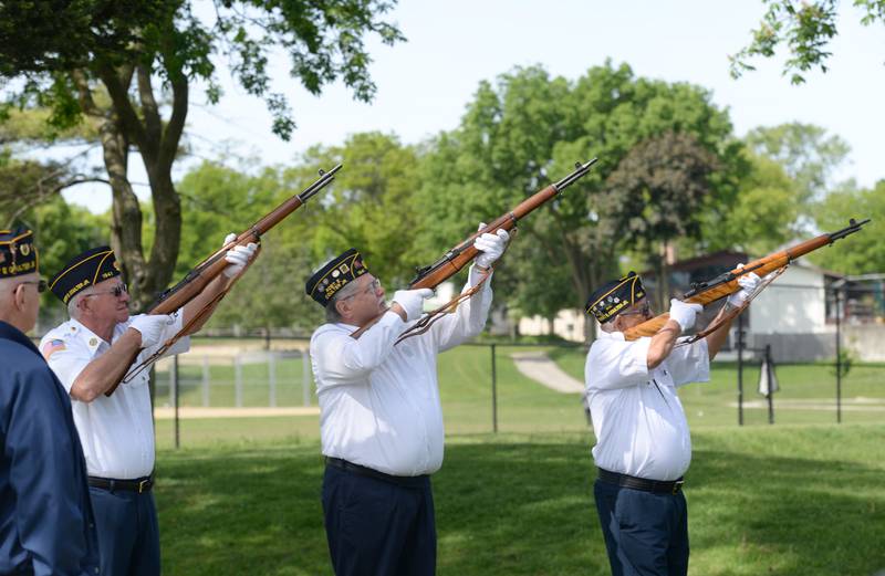 La Grange Park American Legion Post 1941 members provide the rifle salute during the Memorial Day ceremony held at Veterans Memorial Park Monday May 26, 2025.