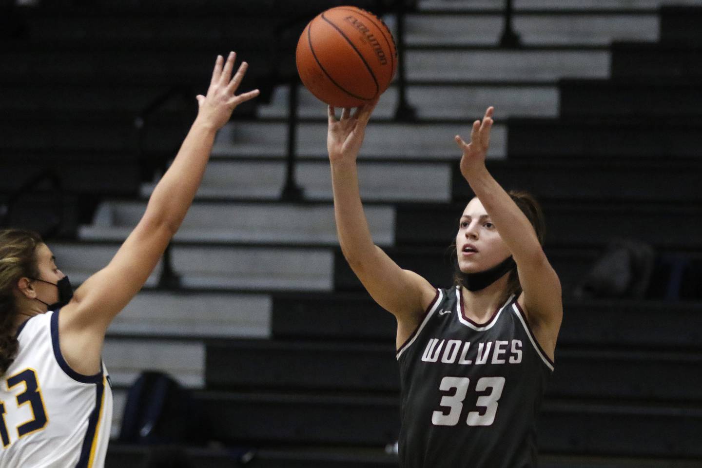 Prairie Ridge's Karsen Karlblom shoots the ball over Round Lake's Lilli Burton during their Northern Illinois Girls Holiday Tournament basketball game Tuesday, Dec. 21, 2021 in McHenry.