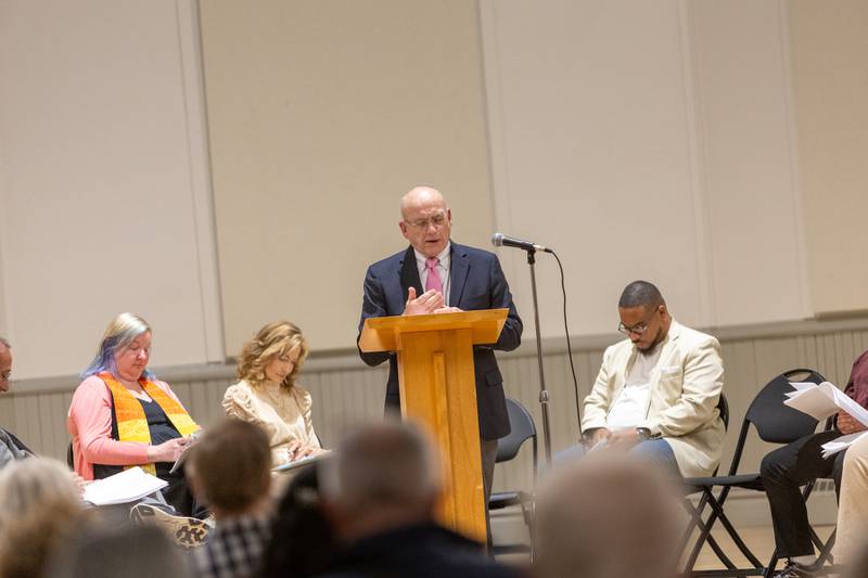 The Rev. Michael Korpon speaks at the International Peace Vigil on Sunday, Nov. 23, 2025, at Shannon Hall in Batavia.