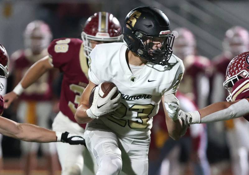 Sycamore's Dylan Hodges finds a hole in the Morris defense during their game Friday, Oct. 20, 2023, at Morris High School.