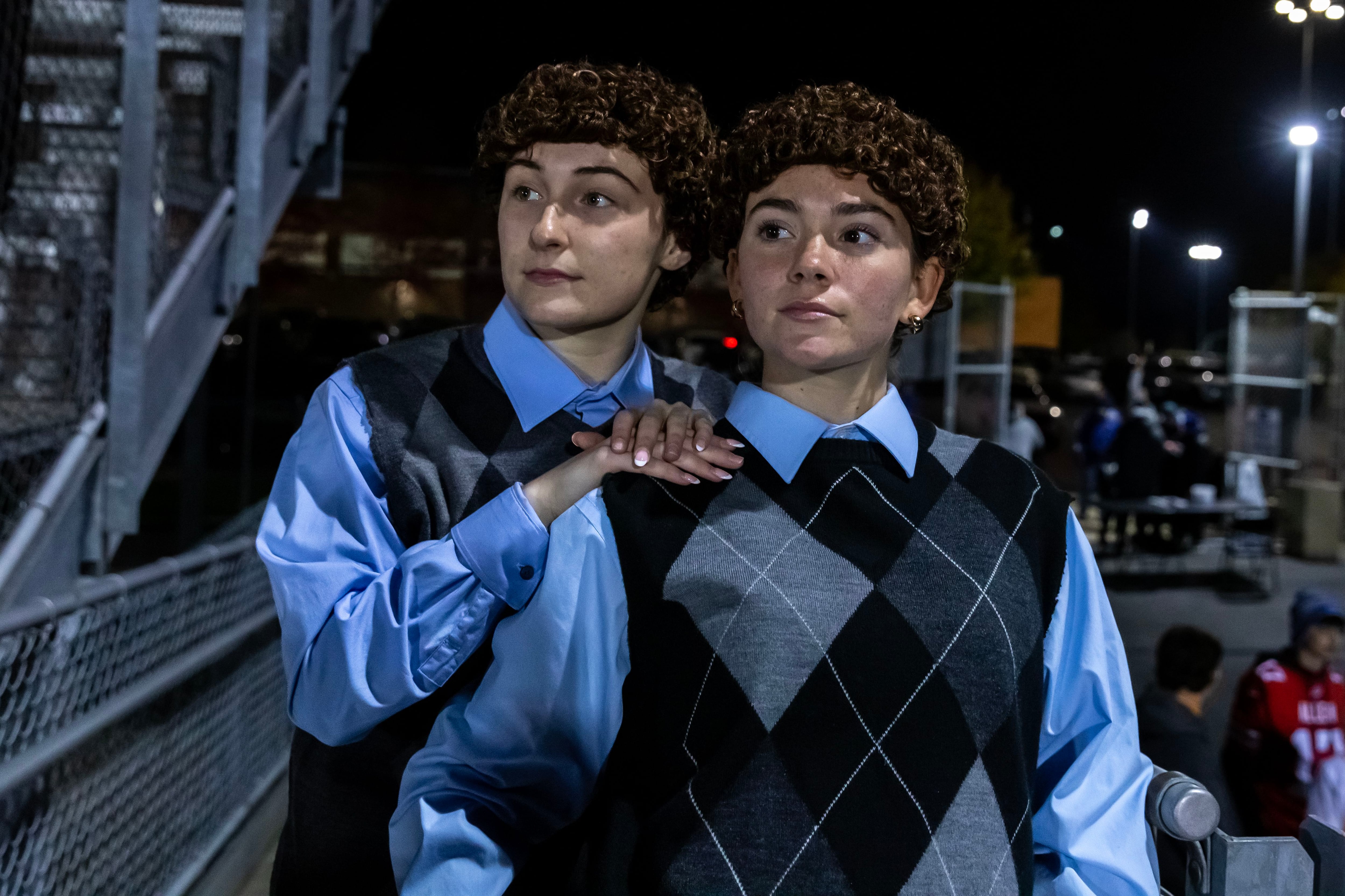 Lincoln-Way East’s super-fans take a Halloween photo prior to a varsity football round one playoff game against Stevenson at Lincoln-Way East on Oct. 31, 2025.