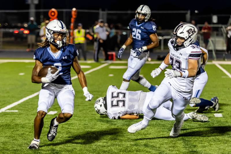 Plainfield South's Buddy Amos makes a move against Plainfield North on Sept. 13, 2024.