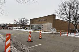 After roof collapse in Woodstock, it’s still unclear when street will reopen, if building can be saved