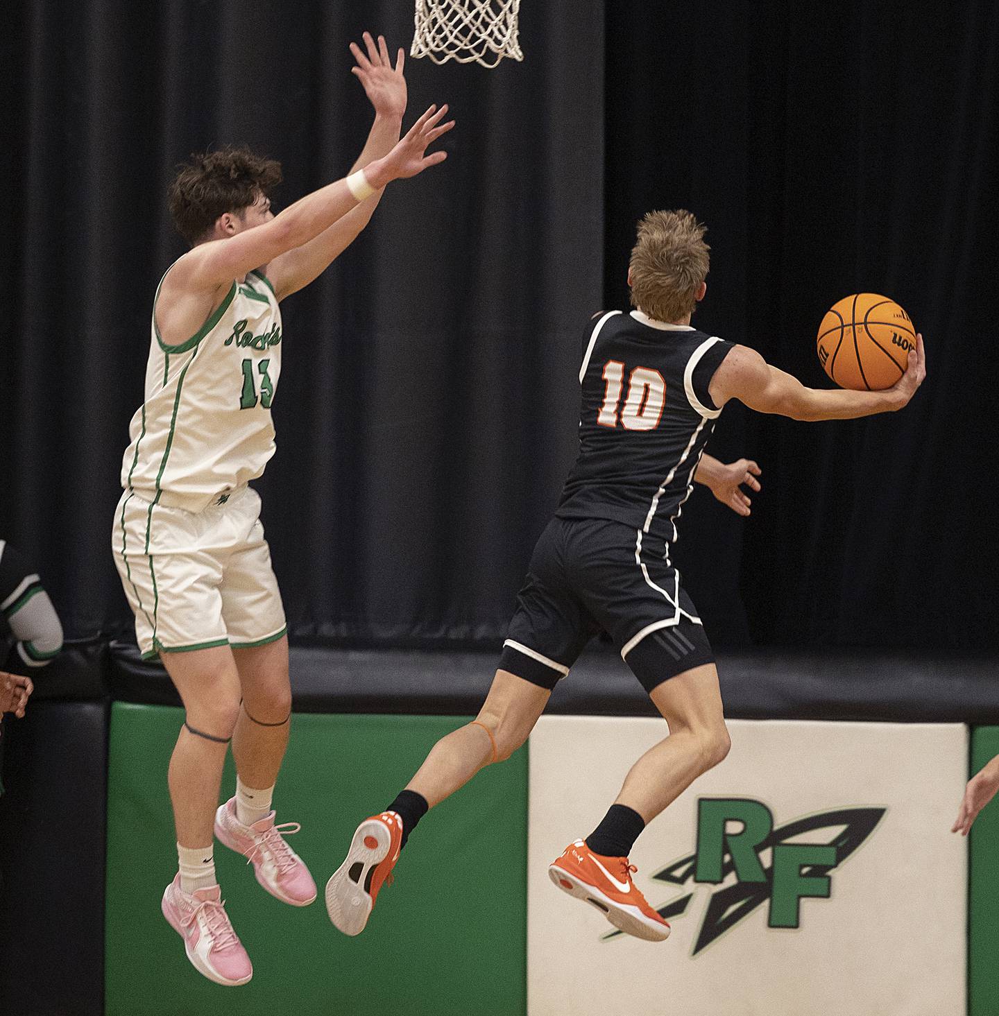 Rock Falls’ Ryken Howard goes up for a block against Byron’s Weston Auker Thursday, Dec. 5, 2024, at Rock Falls High School.