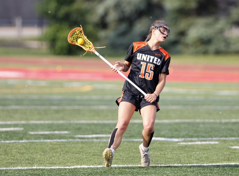 Crystal Lake Central Coop's Emma Sieg (15) looks for an outlet during the lacrosse state semi-final match between Crystal Lake Central and Loyola Academy on Thursday, June 5, 2025 in Hinsdale.