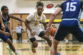 Photos: Joliet West Defeats Plainfield South Boys Basketball
