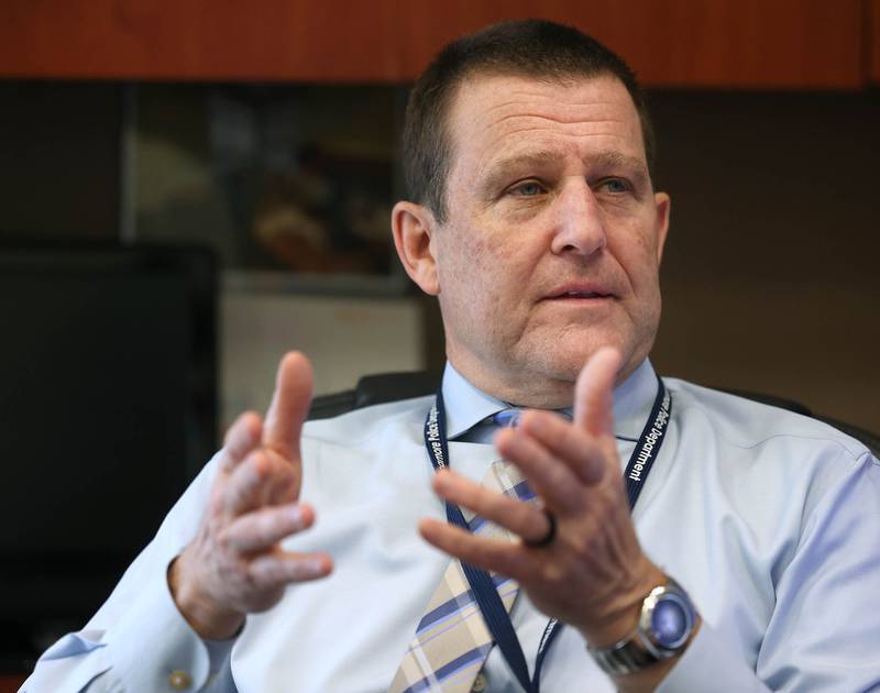 Sycamore Police Chief Jim Winters talks about some of his favorite moments throughout his career Friday, March 14, 2025, in his office at the Sycamore Police Department.  Winters will be retiring later this month.