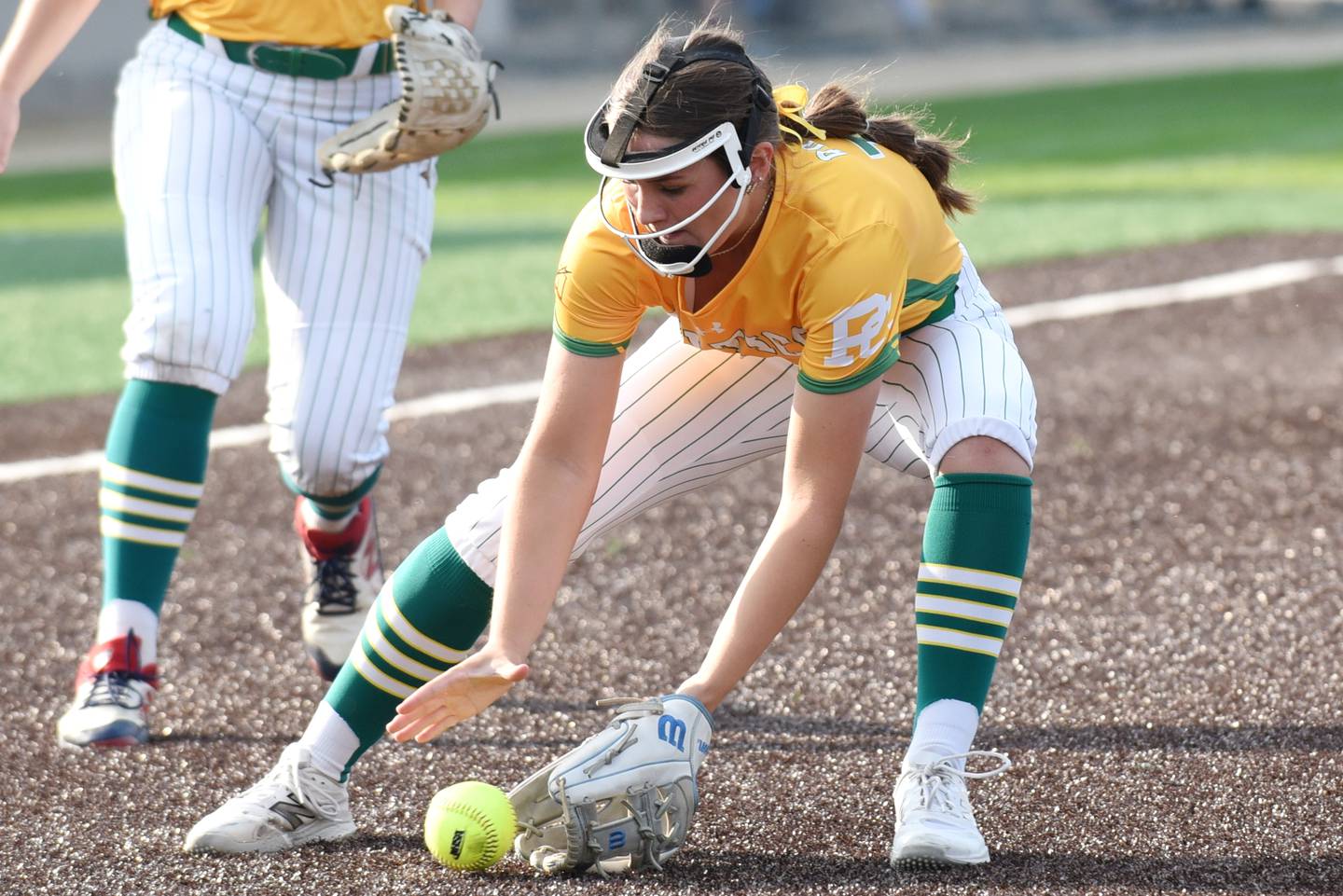 Providence's Macie Robbins fields a bunt during the Class 3A Illinois Wesleyan Supersectional against Pontiac Monday, June 9, 2025.