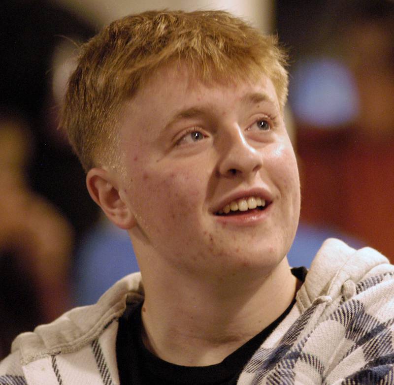Dylan Wescott listens to visitors at his Welcome Home Party at Emerson's Pub on Saturday, Nov. 22.