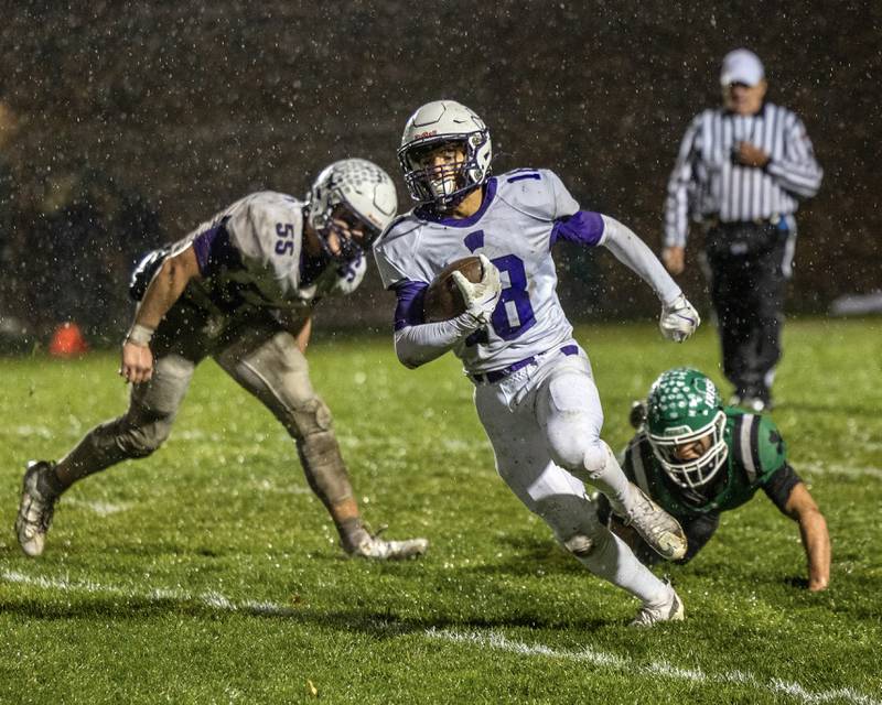 Jay Nevels (18) of Wilmington runs ball as Seneca’s defense falls behind on Saturday, November 8, 2025 at Seneca High School in Seneca.