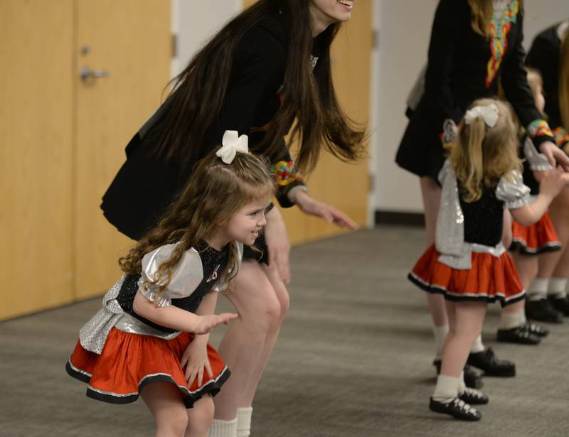 Trinity Irish Dancers including Isla Bolton entertain a full capacity room at the Downers Grove Library Saturday, March 16, 2024.