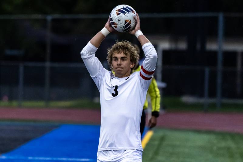 Andrew's Vince Swedberg throws in during the 3A L-W East Regional boys varsity soccer match against Joliet West at Lincoln-Way East on Oct. 21, 2025.